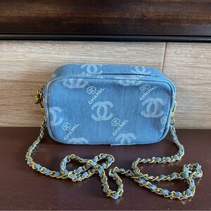 Chanel Denim Blue Crossbody Bag with Gold Chain - Gift With Purchase (GWP) item.